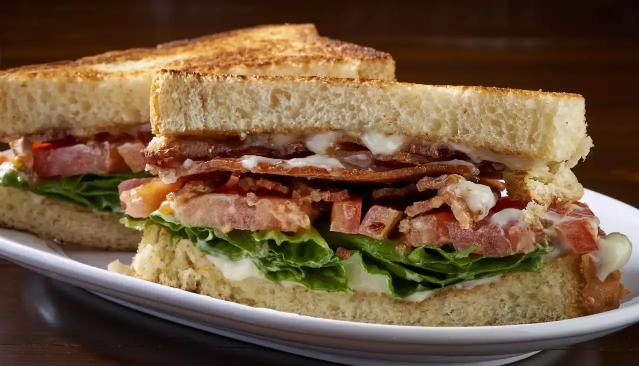 A quarter pound of smoked bacon on Texas Toast with Boston Bibb lettuce, tomato and homemade mayonnaise.
