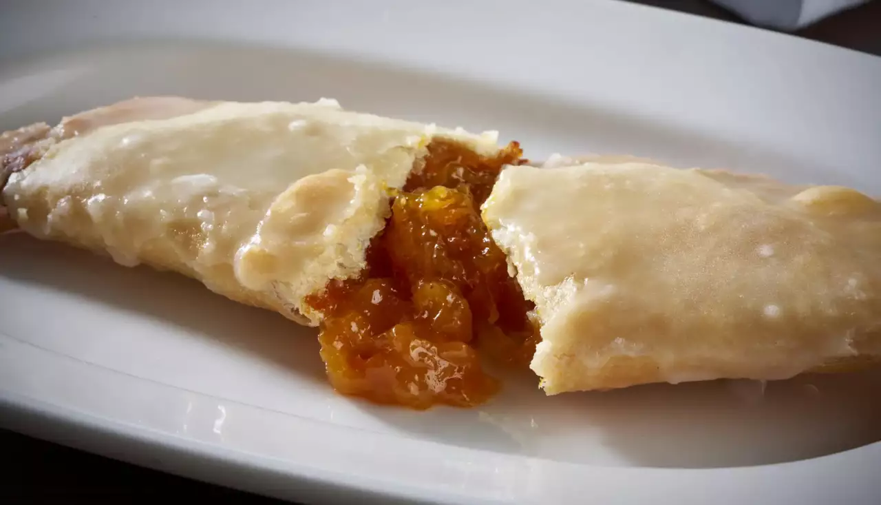 Our sweet and tart apricot filling wrapped in a thin crust, fried to order and covered in vanilla icing.