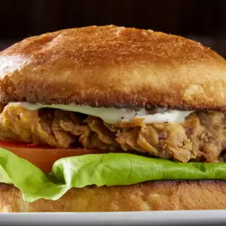 Our tender chicken fried Ribeye steak on a toasted homemade bun, topped with Bibb lettuce and tomato.